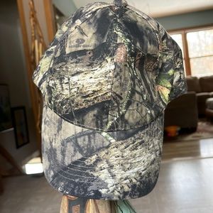 Camouflage hat. Never be seen again. And never worn. 🙂